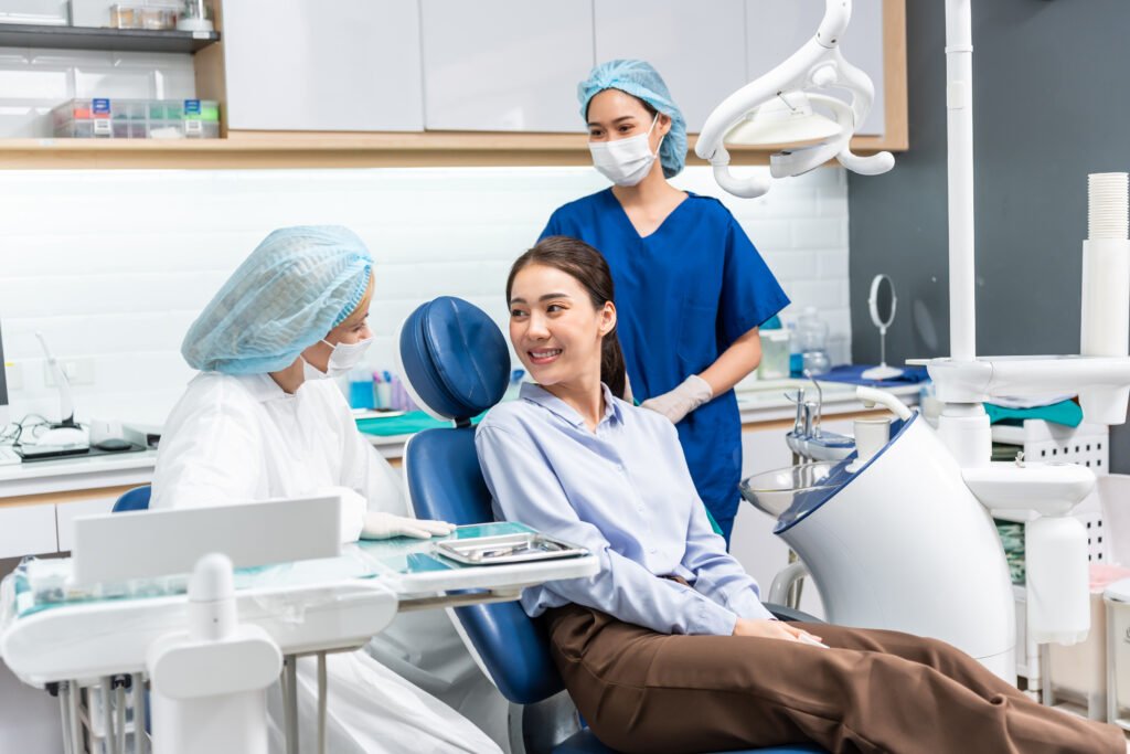 caucasian dentist examine tooth for young girl at 2023 11 27 05 07 25 utc